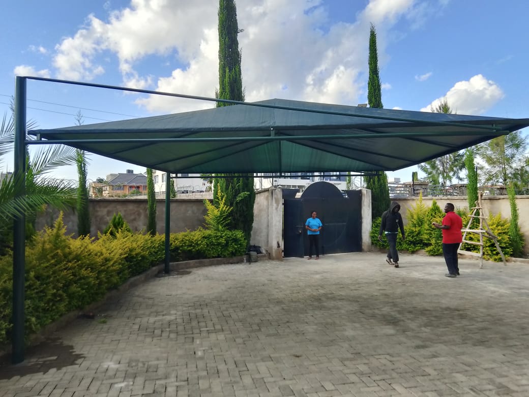 Cantilever car shade installation — project photo 3